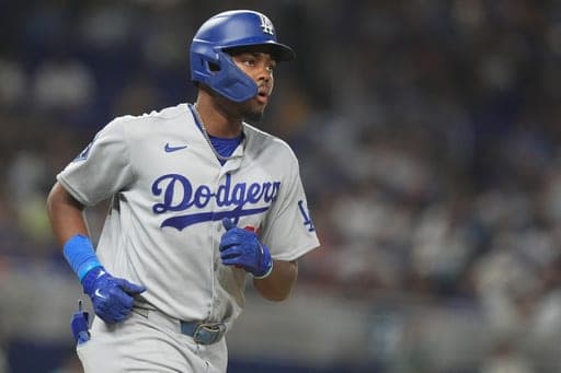 Los Angeles Dodgers' Josue De Paula draws a walk during the ninth inning of a baseball game against the Miami Marlins, Saturday, Sept. 12, 2026, in Miami. (AP Photo/Lynne Sladky) (AP Photo/Lynne Sladky)