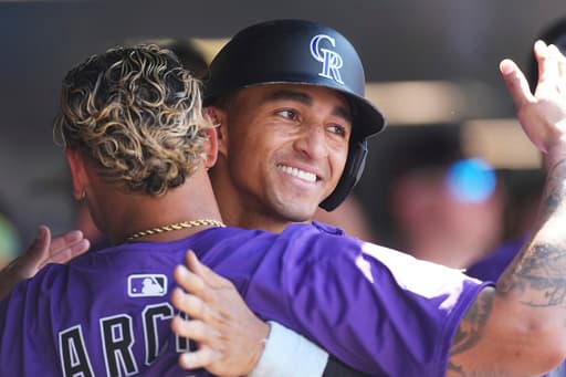 Major league-worst Rockies rally again to beat the Diamondbacks, 6-5