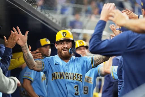 Milwaukee’s Mitchell doubles in the 10th in 7-5 win over Miami