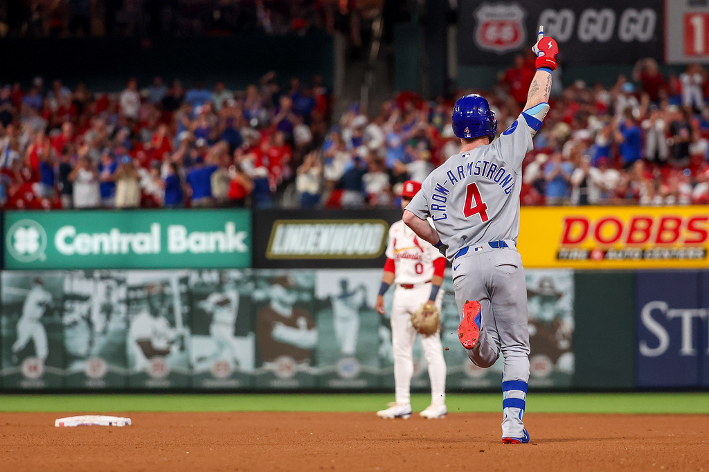 Pete Crow-Armstrong rounds the bases after a tenth-inning home run at Busch Stadium