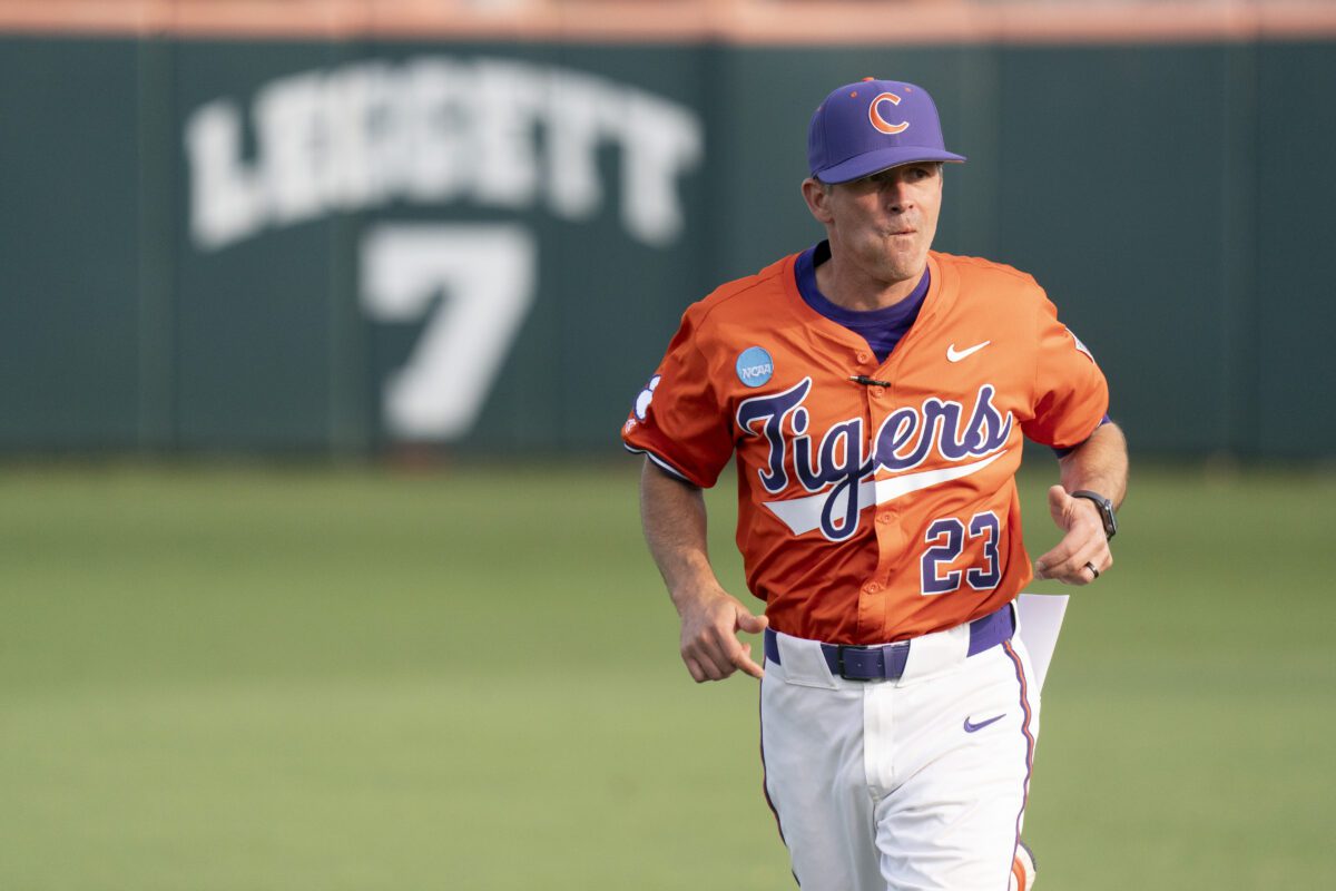 Clemson coach Erik Bakich jogs across the field before an NCAA regional baseball game against High Point on Friday, May 31, 2024, in Clemson, S.C. Clemson won 4-3