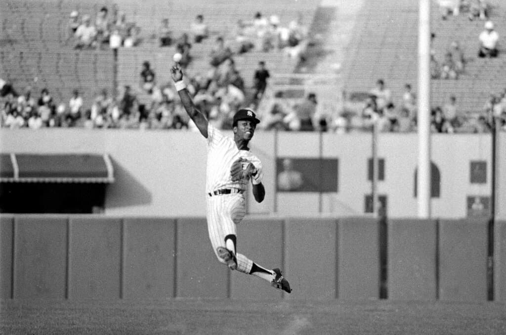 Title: WILLIE RANDOLPHImage ID: 780731012 Article: Willie Randolph of the New York Yankees throws the ball to first base to nab the Minnesota Twins' Rod Carew in the ninth inning of Sunday's second doubleheader game at Yankee Stadium July 31, 1978. (AP Photo/Ray Stubblebine) 