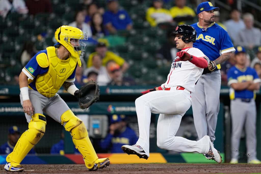 Great Britain’s Trayce Thompson slides home to score against Brazil during the 2026 World Baseball Classic in Houston.