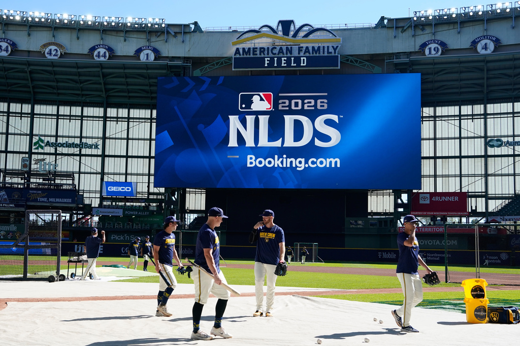 The Brewers take batting practice before Game 2 of the National League Division Series.