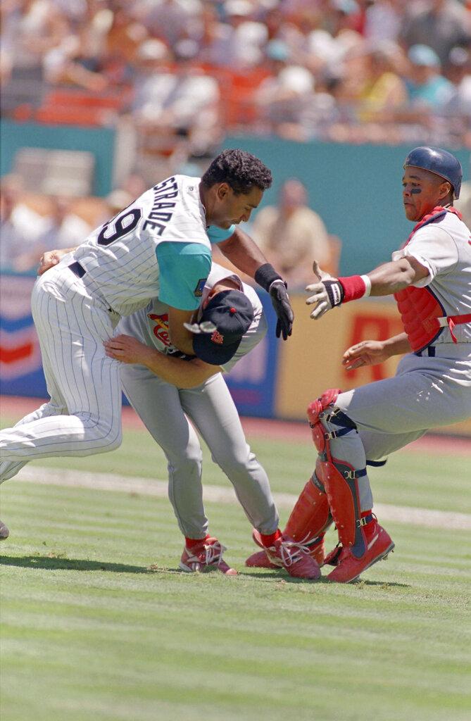 Orestes Destrade charges the mound at Allen Watson during a 1994 bench-clearing brawl.