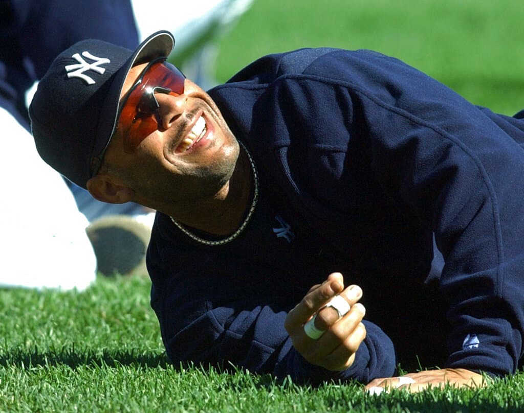 New York Yankees' Gary Sheffield smiles as he stretches Monday, Oct. 11, 2004 at Yankee Stadium in New York. The Yankees will play the Boston Red Sox in the American League Championship Series beginning Tuesday. (AP Photo/Bill Kostroun)