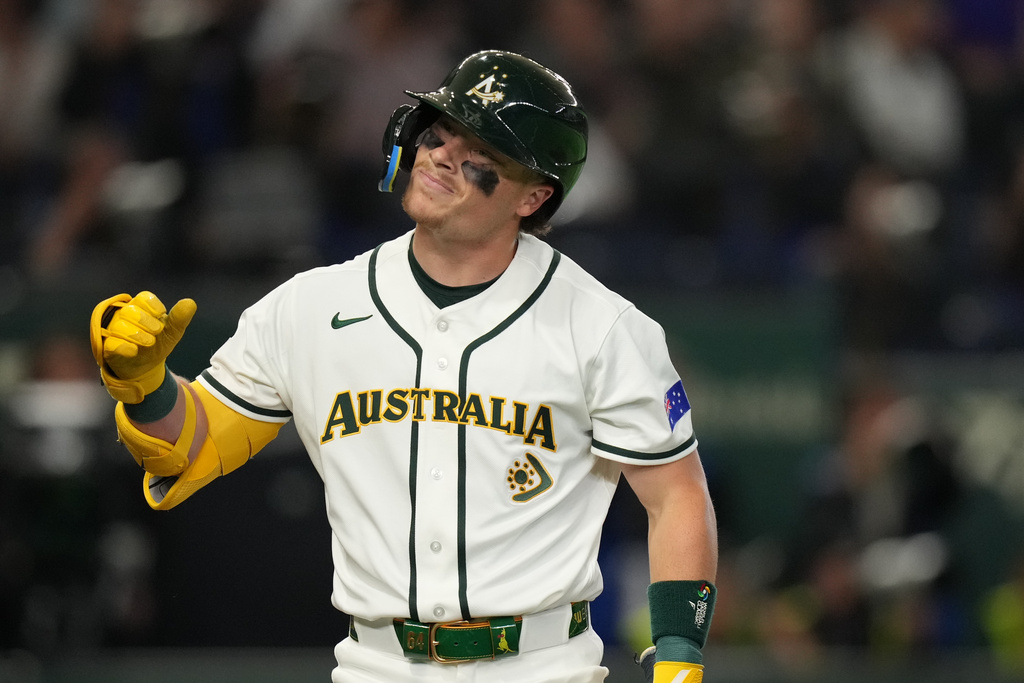 Travis Bazzana reacts after a foul ball while batting for Australia at the World Baseball Classic.