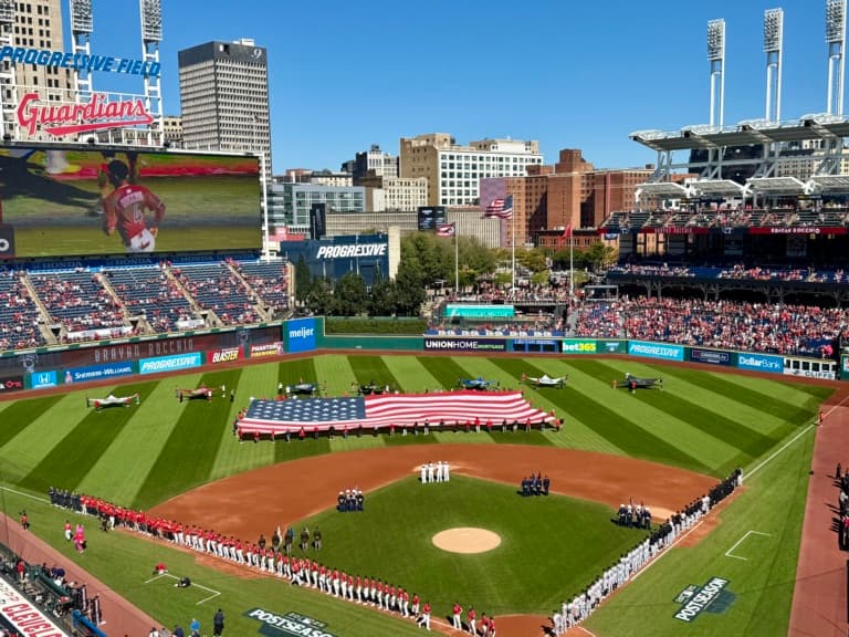 The national anthem taking place at Progressive Field Tuesday afternoon prior to Game 1 of the AL Wild Card between the Tigers and Guardians – Image Credit: Larry C. Arreguin/Latino Sports