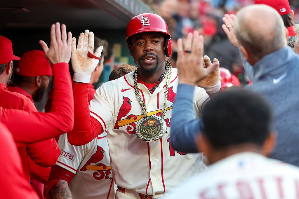 Jordan Walker congratulated by teammates after a home run against the Dodgers