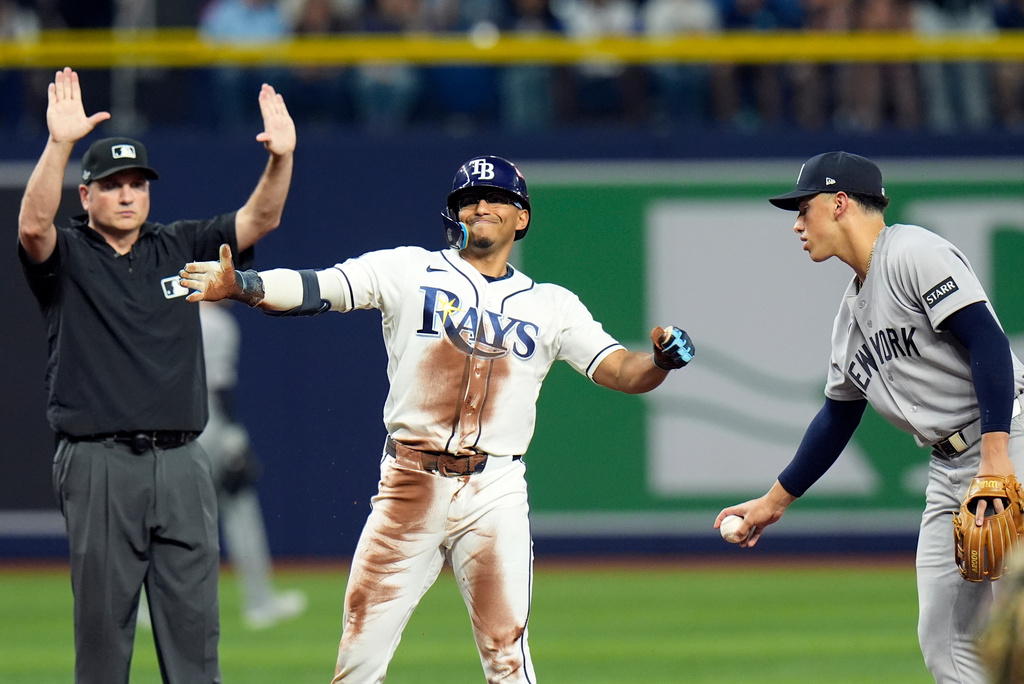 Rays infielder Richie Palacios celebrates a double in Game 1 of the American League Division Series.
