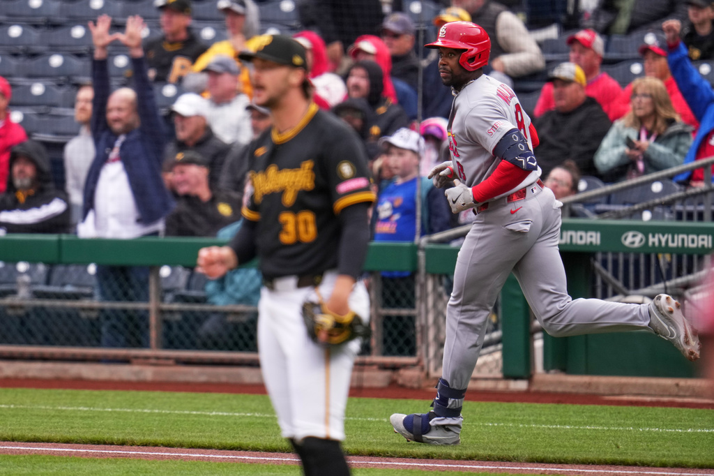 Jordan Walker watches his home run off Paul Skenes
