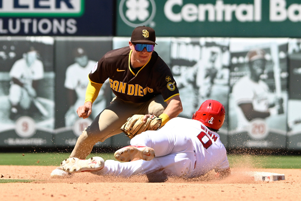 Padres infielder Will Wagner tags out the Cardinals' Masyn Winn at second base in St. Louis, June 2026.