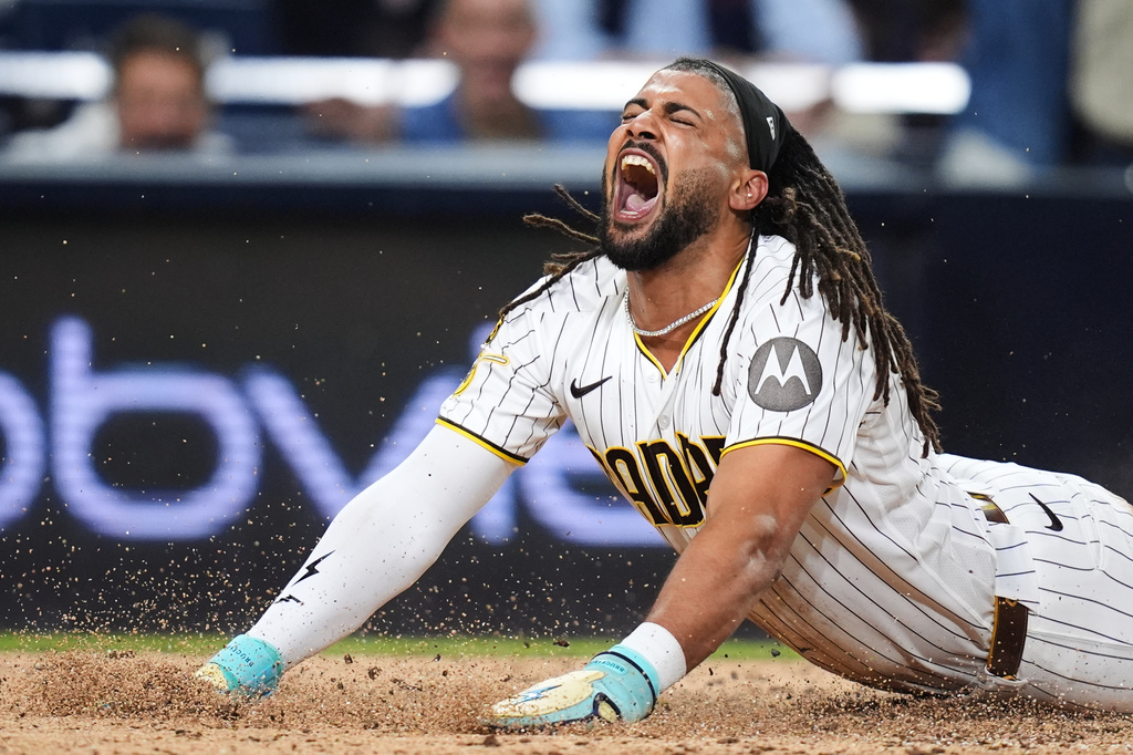 San Diego Padres Fernando Tatis Jr. slides into home plate