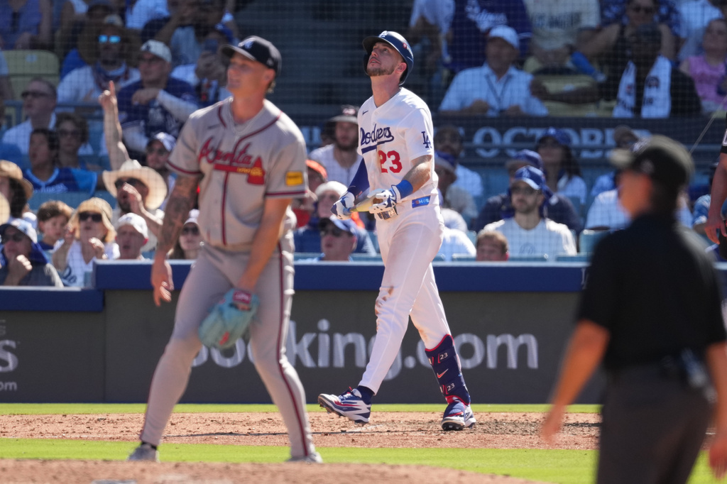 Los Angeles Dodgers' Kyle Tucker (23) watches his two-run home run during the sixth inning of Game 1 of a National League Division Series baseball game 
