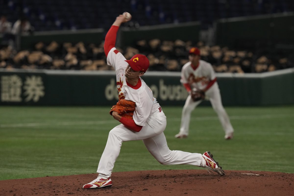 Alan Zhang Carter pitches at Tokyo Dome during the 2023 World Baseball Classic; he now signs with Dorados de Chihuahua for the 2025 Liga Mexicana de Beisbol season.