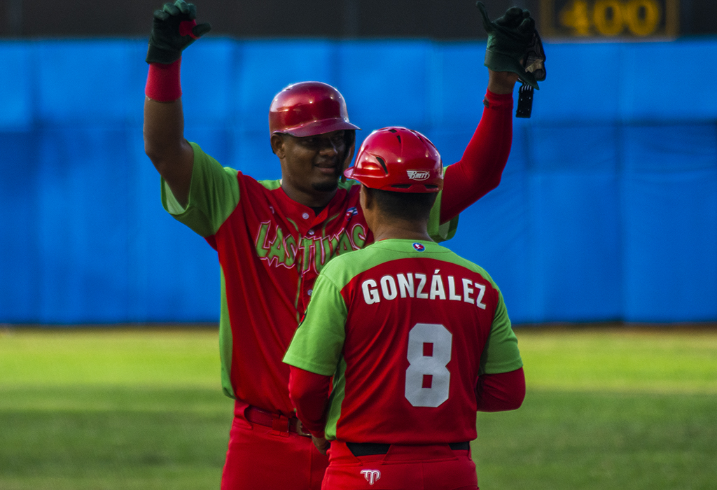 Yosvany Alarcón, catcher for Leñadores de Las Tunas, celebrates during the 2023 Serie Nacional Final against Industriales at Estadio Julio Antonio Mella in Cuba.