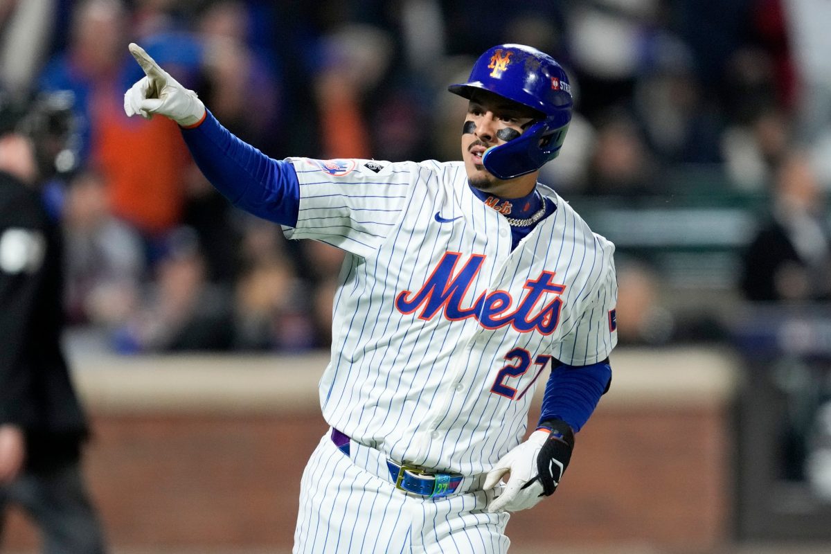 New York Mets’ Mark Vientos celebrates after hitting a home run against the Los Angeles Dodgers in Game 4 of the 2024 NLCS at Citi Field. (AP Photo/Ashley Landis)