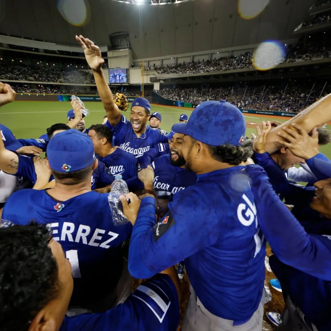 Nicaragua’s national baseball team celebrates on the field at Taipei Dome after qualifying for the 2026 World Baseball Classic with a 6-0 win over Chinese Taipei.