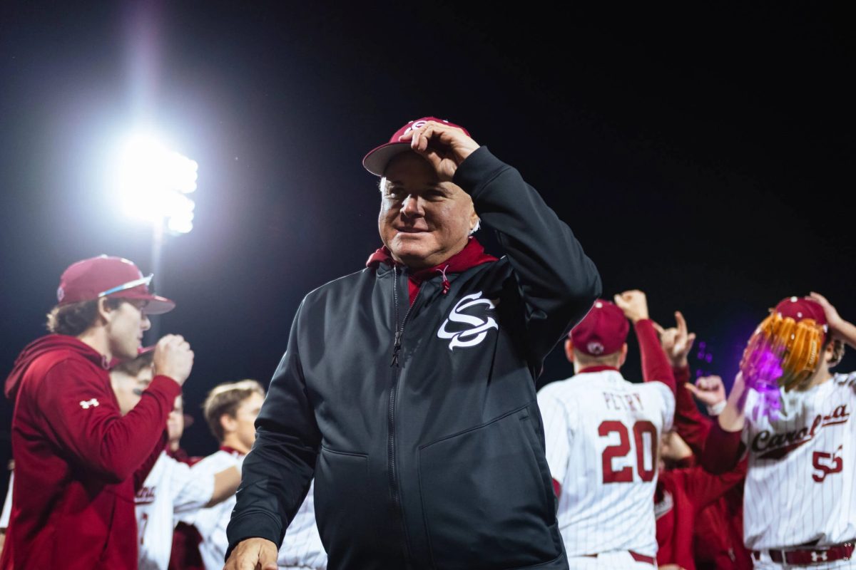 Paul Mainieri celebrates with South Carolina baseball players during the 2025 season. (Photo: South Carolina Athletics)