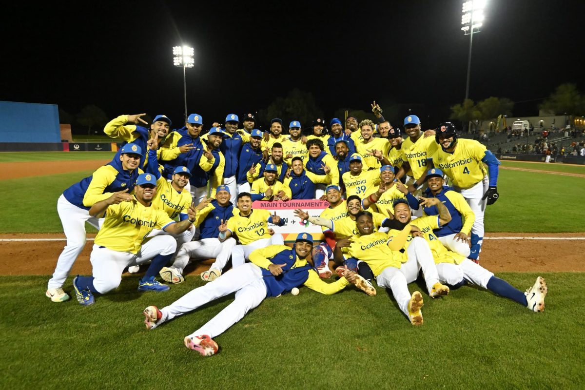 Colombia baseball team celebrates a 10-0 mercy-rule victory over Germany at the 2025 WBC Qualifiers in Tucson, securing a spot in the 2026 World Baseball Classic.