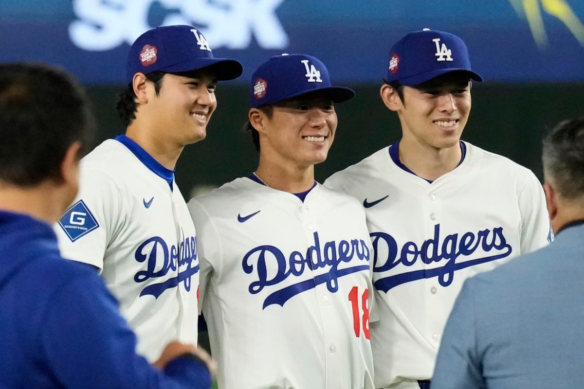 Shohei Ohtani, Yoshinobu Yamamoto, and Roki Sasaki posing after Dodgers win in Tokyo during the 2025 MLB Tokyo Series