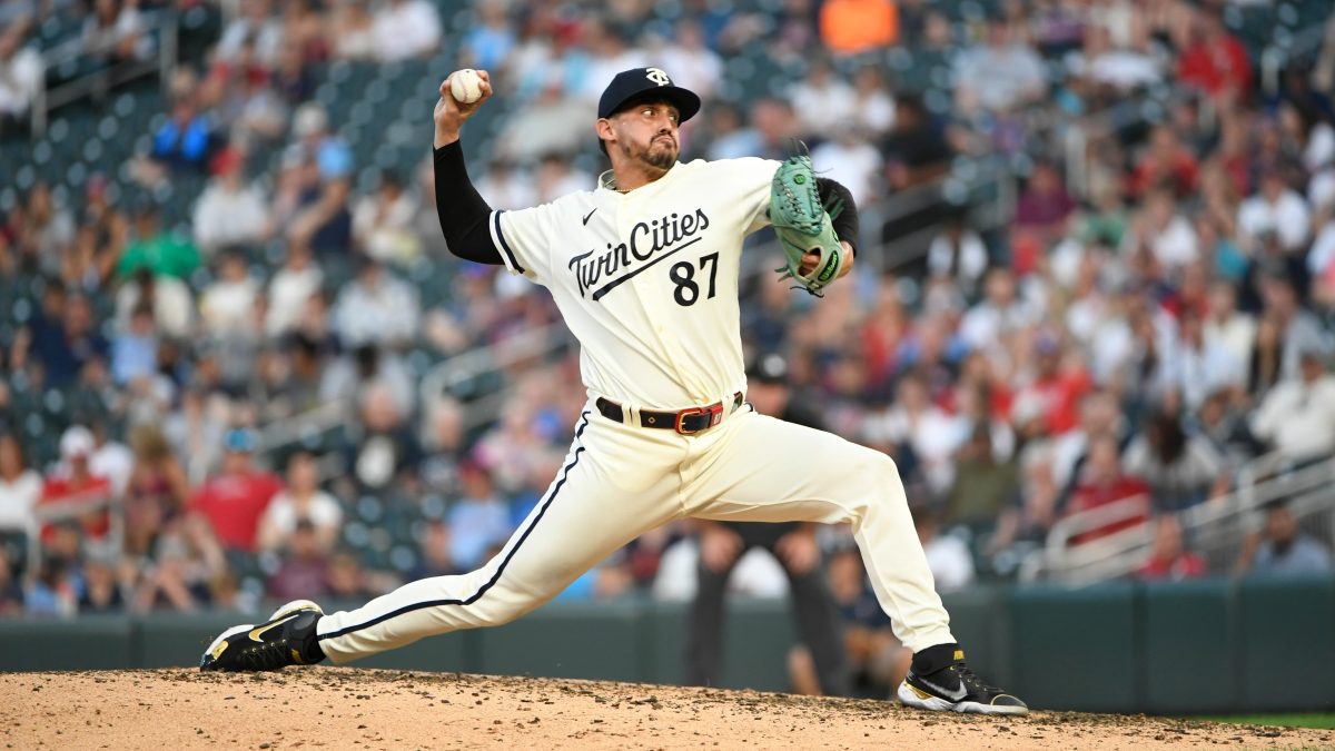 Jose De Leon pitching during a game before signing a minor league contract with the Boston Red Sox.