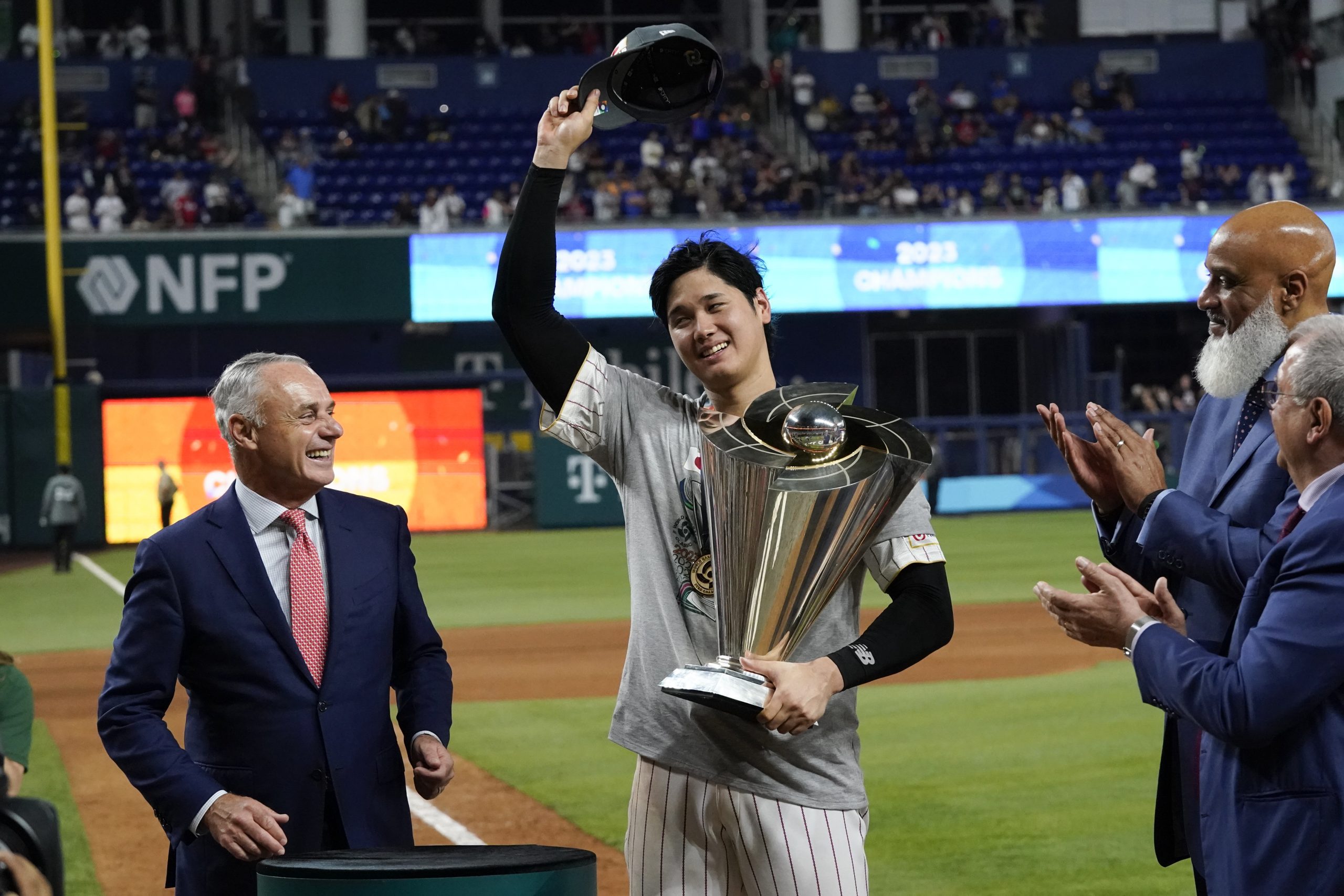 Japan's Shohei Ohtani receives the World Baseball Classic trophy on behalf of the team after defeating the United States in the World Baseball Classic championship game