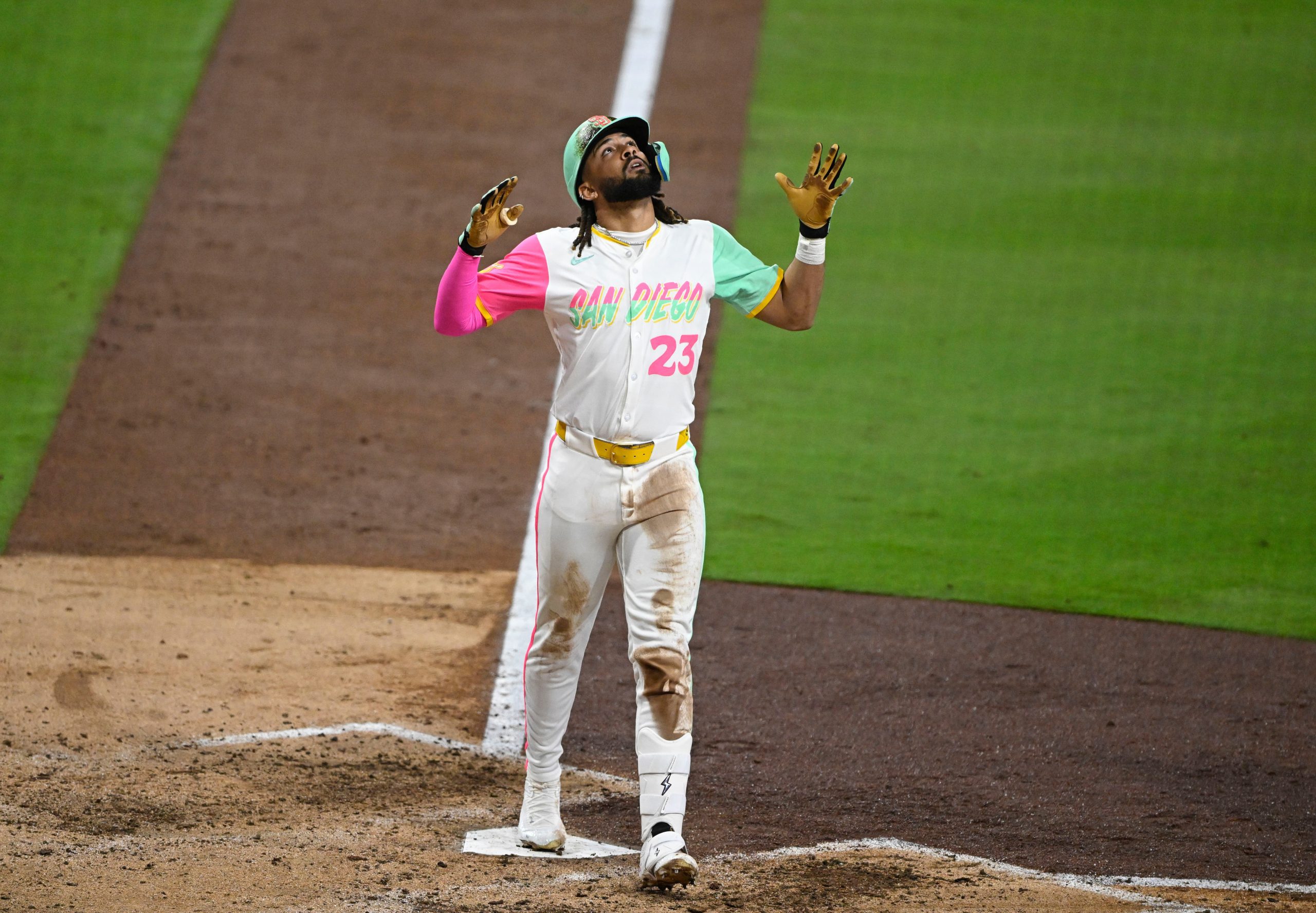 Fernando Tatis Jr, who plans to play for the Domincan Republic in 2026, looks skyward after hitting a home run
