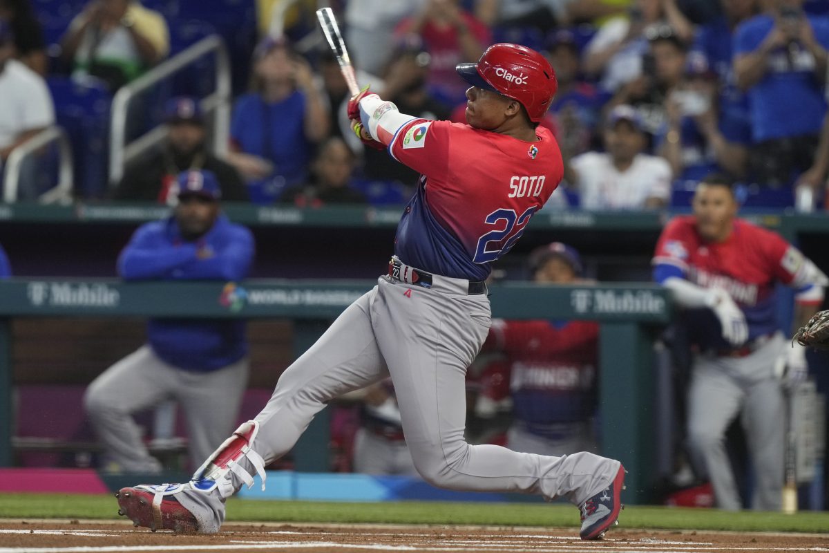 Dominican Republic Juan Soto (22) hits a single to left field during the first inning of a World Baseball Classic game against Nicaragua, Monday, March 13, 2023, in Miami.