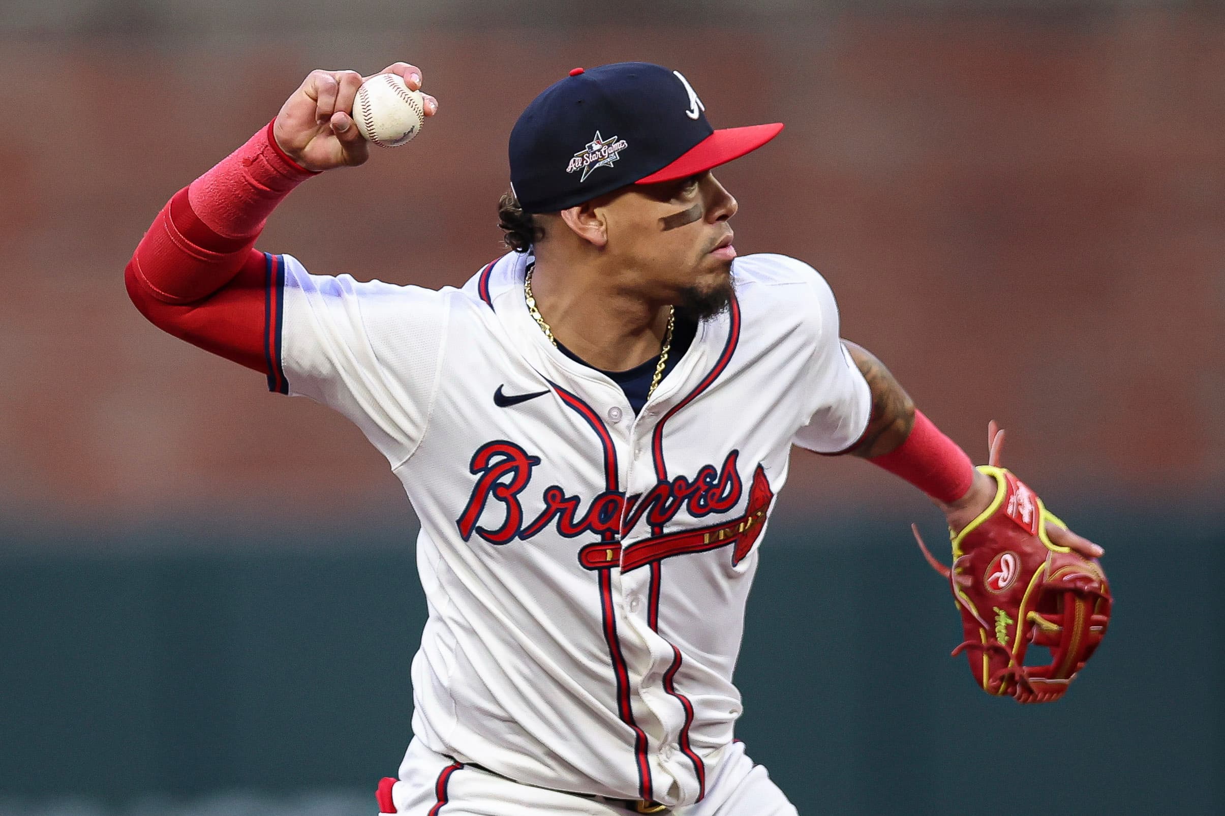 Atlanta Braves shortstop Orlando Arcia makes a throw to first base in the second inning of a baseball game against the St. Louis Cardinals, Tuesday, April 22, 2025, in Atlanta.
