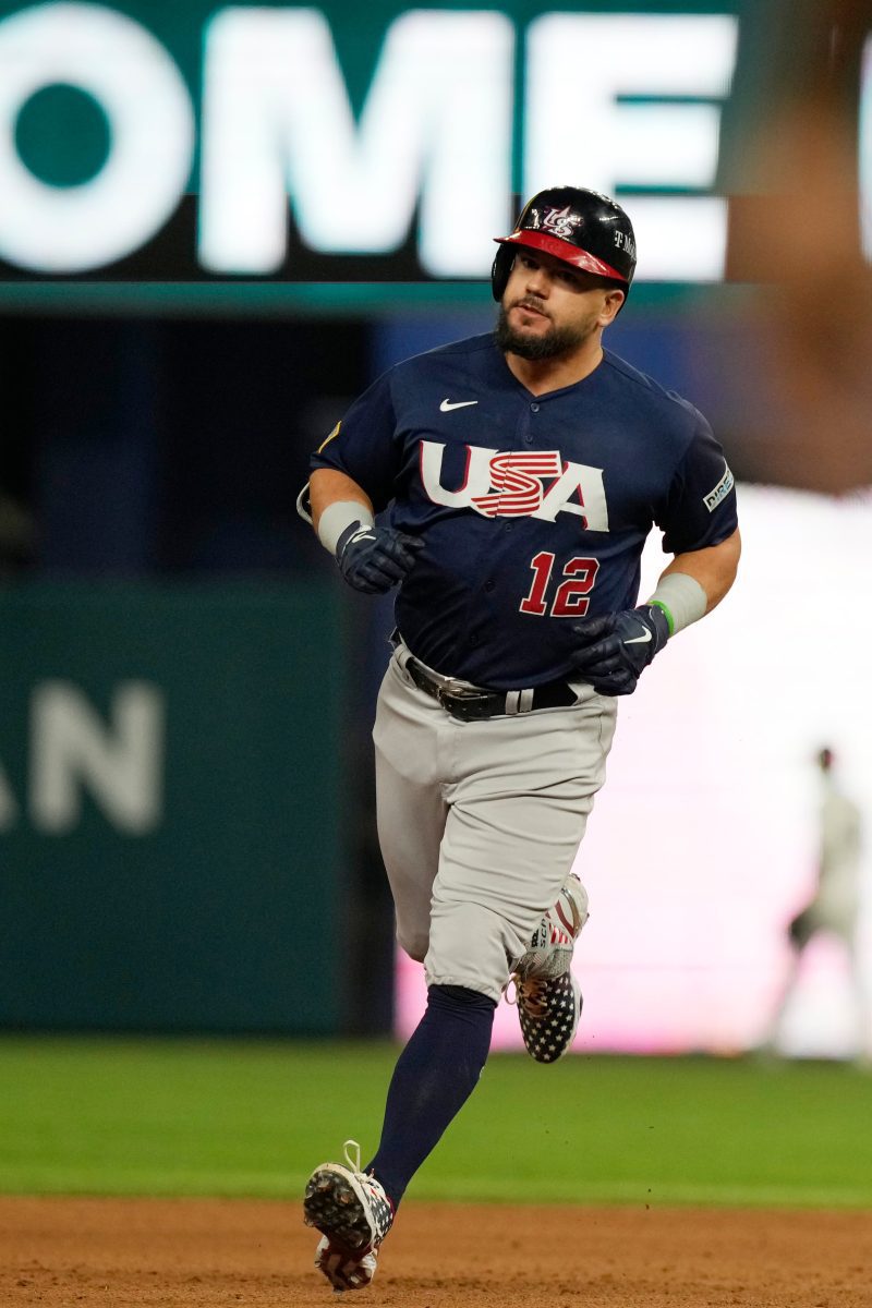 United States' Kyle Schwarber, right, celebrates with teammates after hitting a three-run home run against Great Britain during the fourth inning of a World Baseball Classic game in Phoenix, Saturday, March 11, 2023.