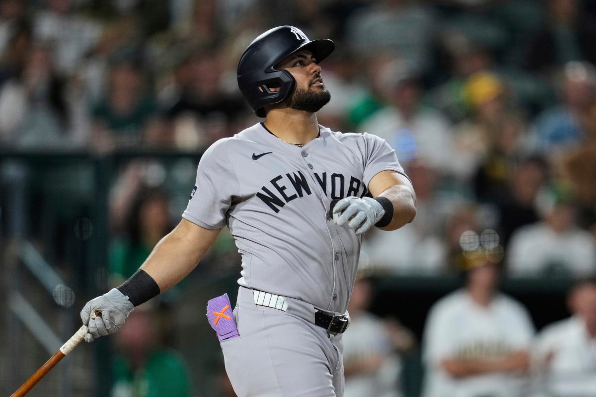 New York Yankees' Jasson Domínguez watches his grand slam during the eighth inning of a baseball game against the Athletics, Friday, May 9, 2025, in West Sacramento, Calif.