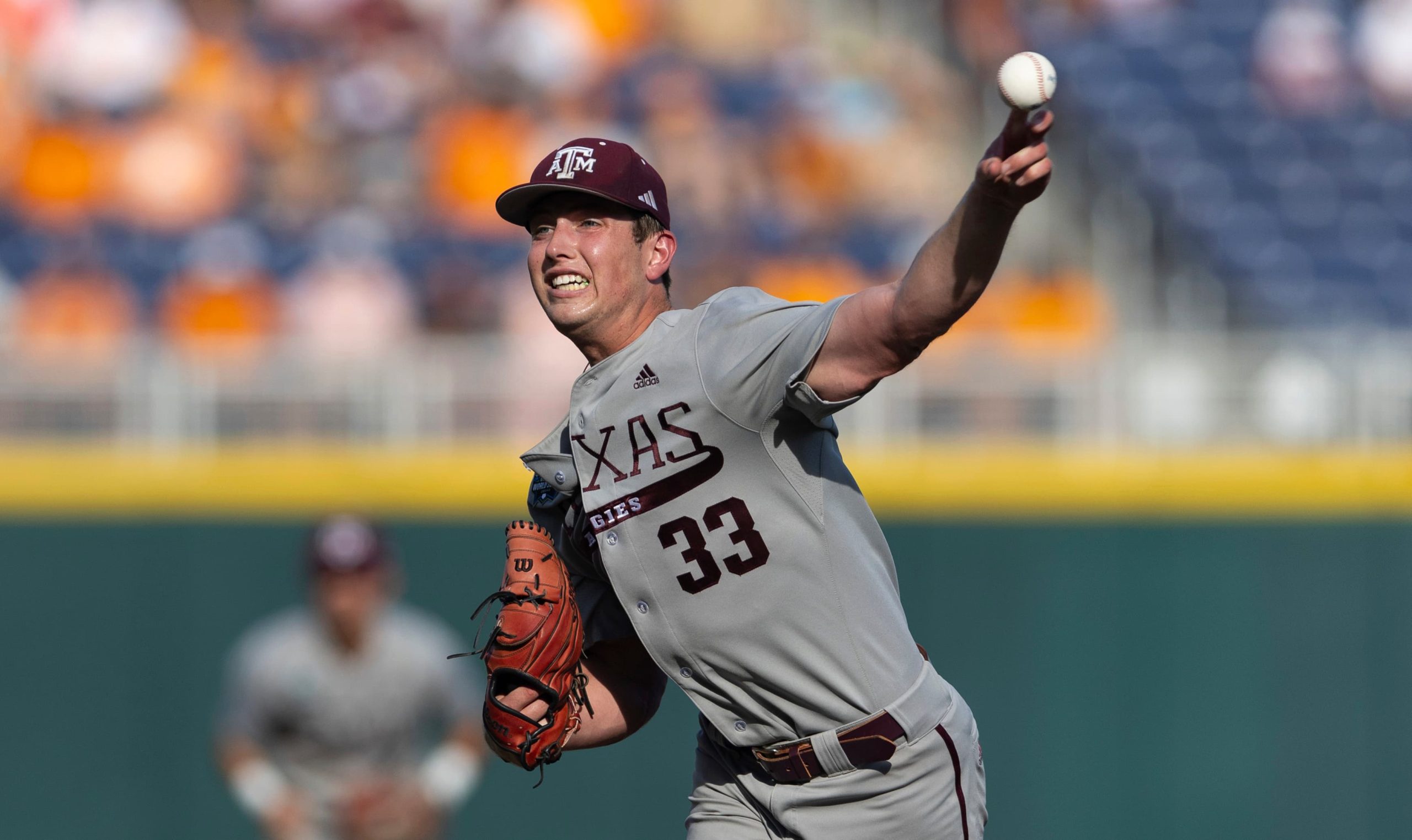 Texas A&M starting pitcher Justin Lamkin throws against Tennessee in the first inning of Game 3 of the NCAA College World Series baseball finals in Omaha, Neb., Monday, June 24, 2024.