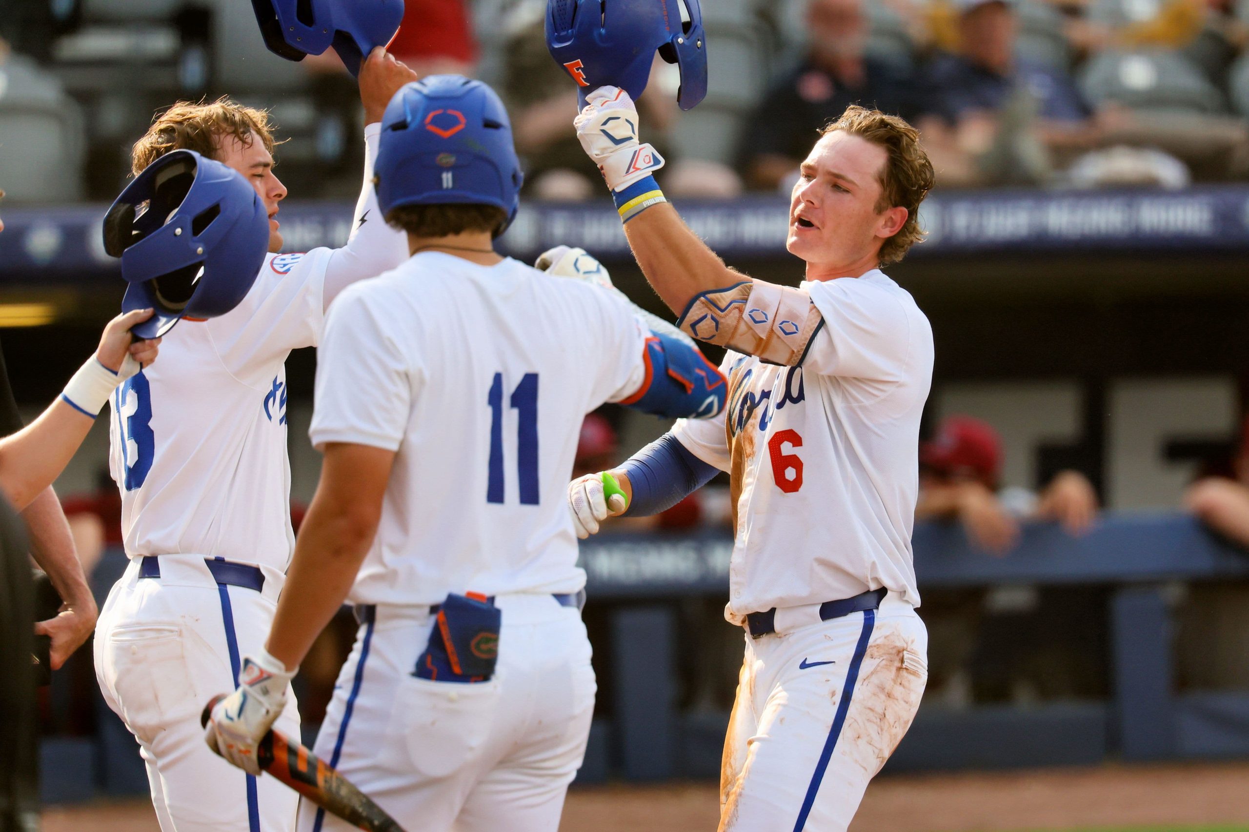 Bobby Boser of the Florida Gators celebrates home run