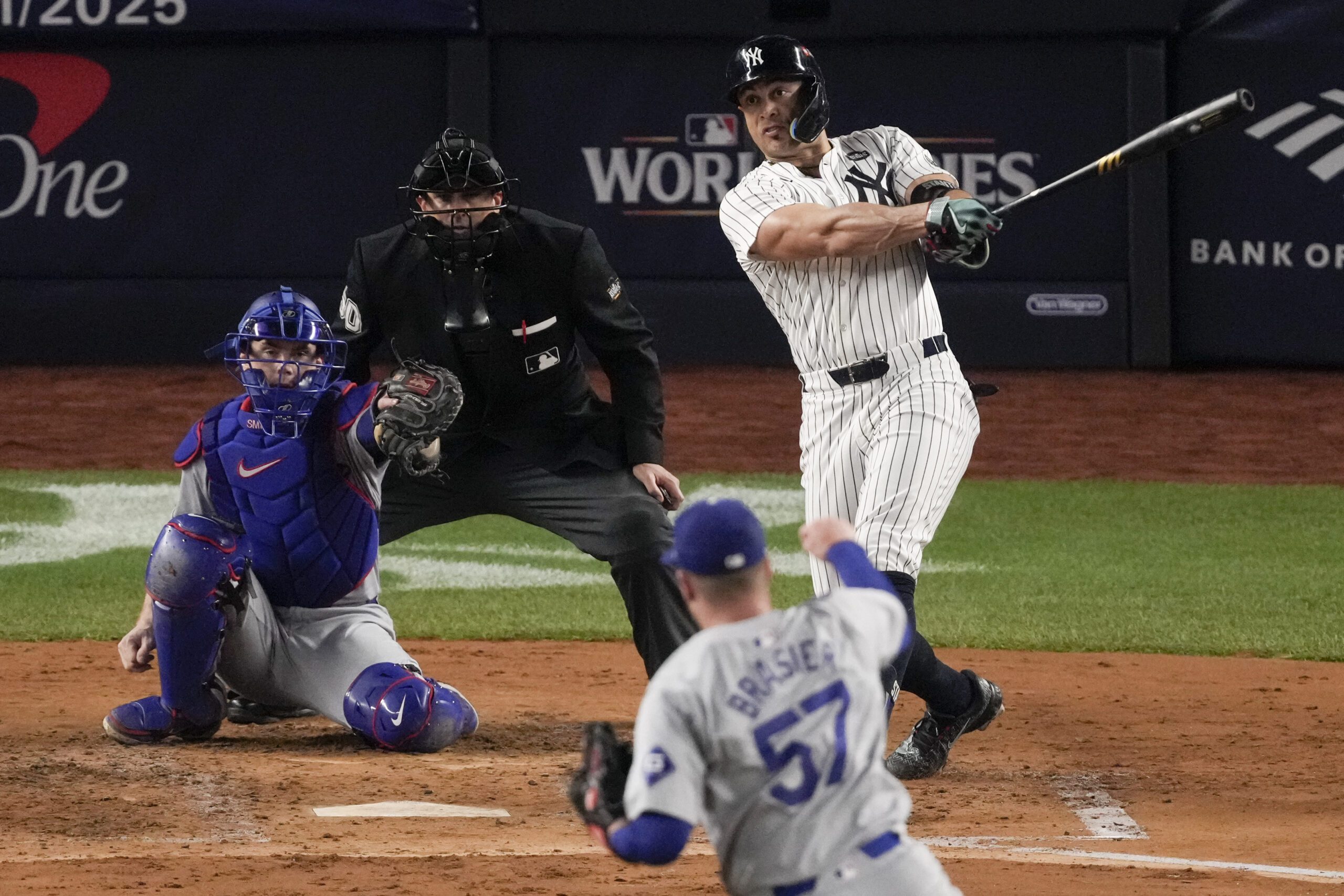 New York Yankees' Giancarlo Stanton watches a home run against the Los Angeles Dodgers during the third inning in Game 5 of the baseball World Series, Wednesday, Oct. 30, 2024, in New York. (AP Photo/Frank Franklin II)