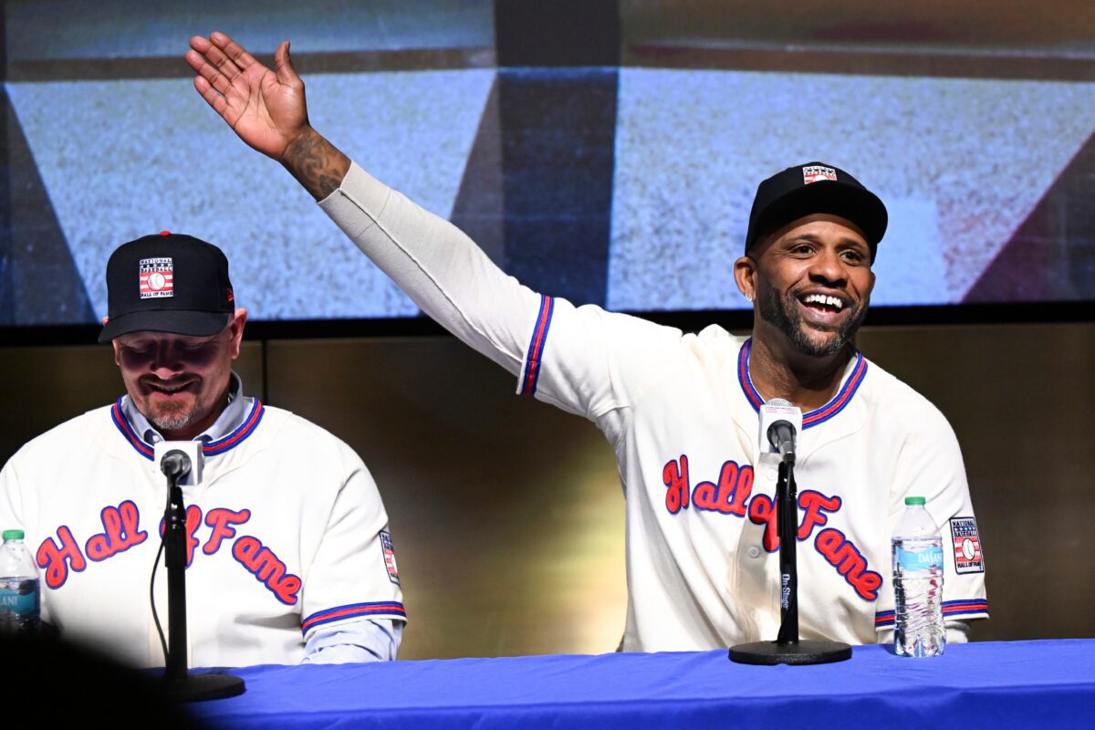 Title: Hall of Fame Baseball Image ID: 25023713799426 Article: Newly-elected Baseball Hall of Fame inductee Billy Wagner, left, listens as CC Sabathia talks to reporters during a news conference Thursday, Jan. 23, 2025, in Cooperstown, N.Y. (AP Photo/Hans Pennink)