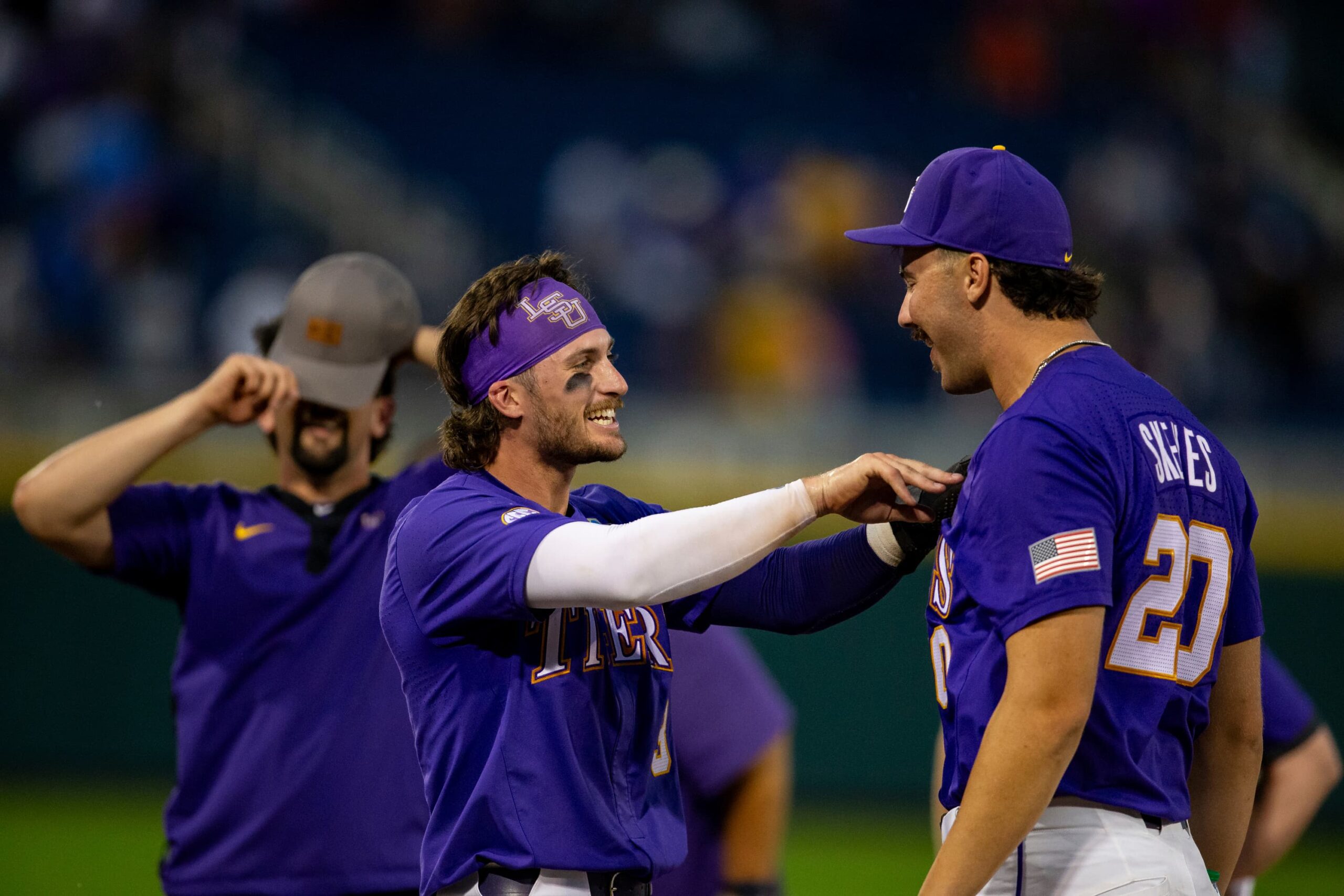 LSU Dylan Crews (3) celebrates with Paul Skenes (20) the win over Wake Forest in a baseball game at the NCAA College World Series in Omaha, Neb., Thursday, June 22, 2023.