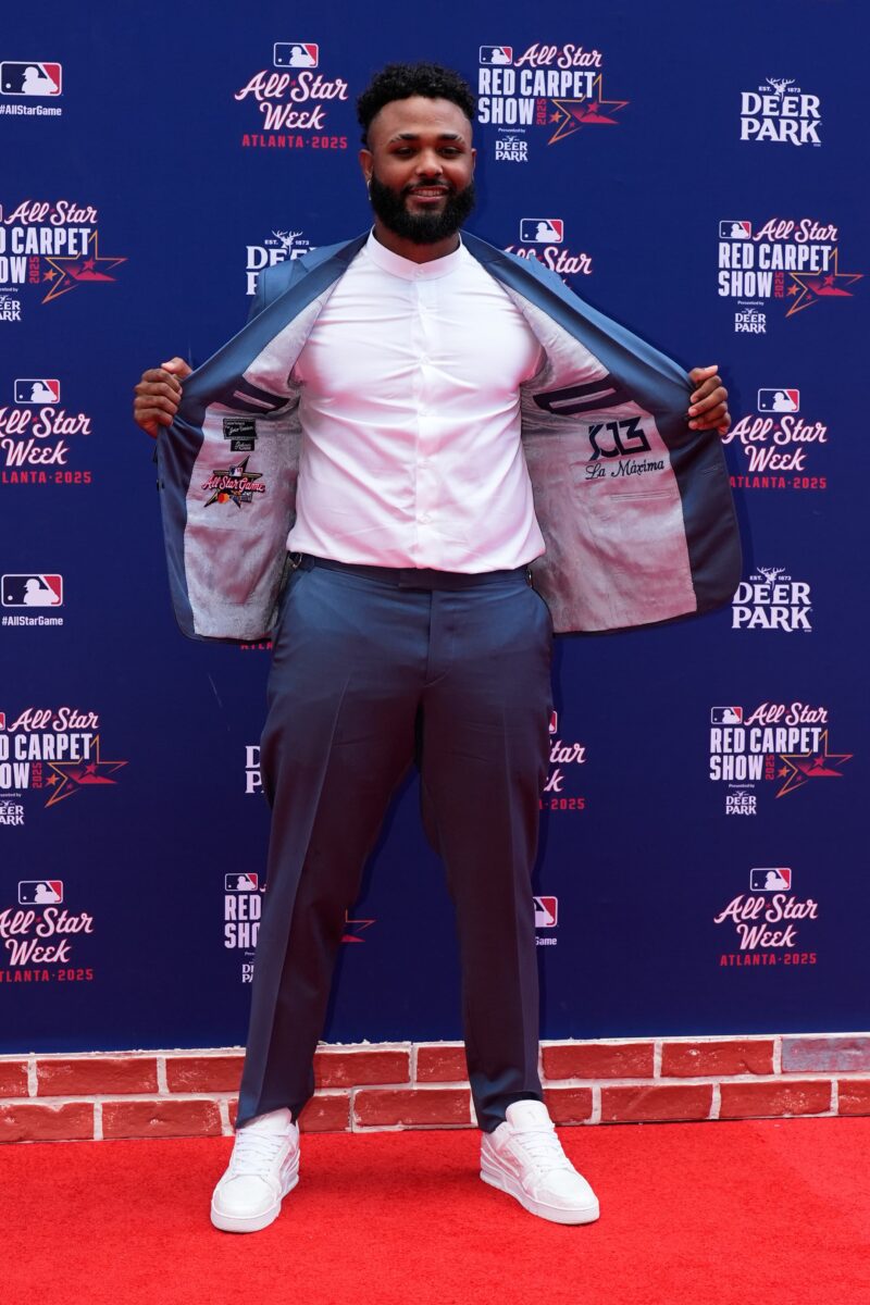 Tampa Bay Rays' Junior Caminero arrives on the red carpet for the MLB baseball All-Star game, Tuesday, July 15, 2025, in Atlanta. (AP Photo/Mike Stewart)