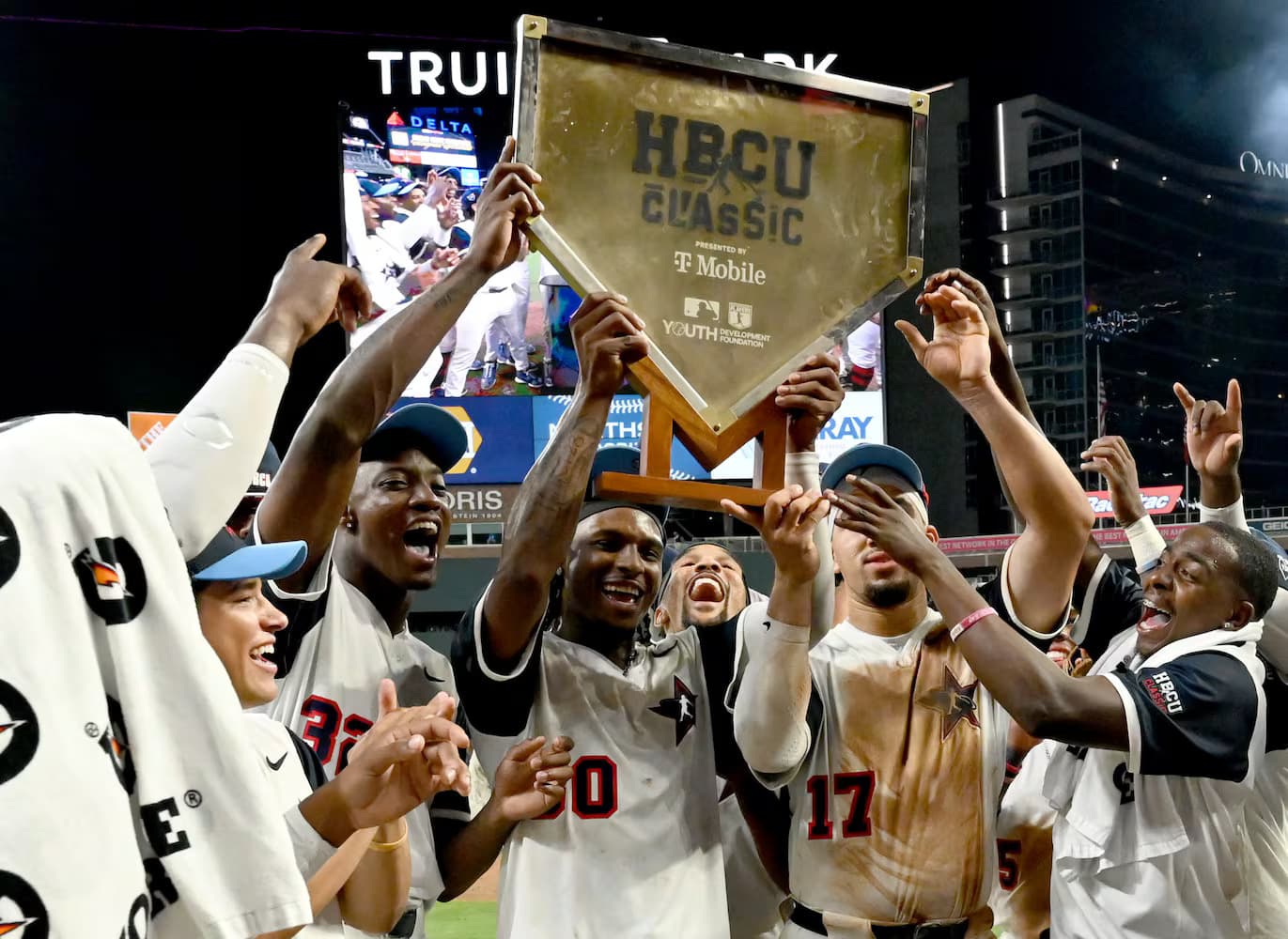 Players from HBCUs gather at home plate during the 2025 HBCU Swingman Classic at Truist Park on July 11, 2025. Photo Credit: Photo by Miguel Martinez The Atlanta Journal-Constitution