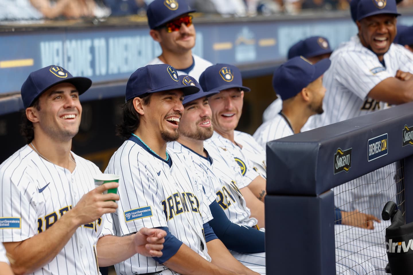 Title: Giants Brewers Baseball Image ID: 25236682917448 Article: Milwaukee Brewers players laugh during the Bob Uecker Celebration of Life ceremony before a baseball game between the San Francisco Giants and the Milwaukee Brewers, Sunday, Aug. 24, 2025, in Milwaukee. (AP Photo/Jeffrey Phelps)