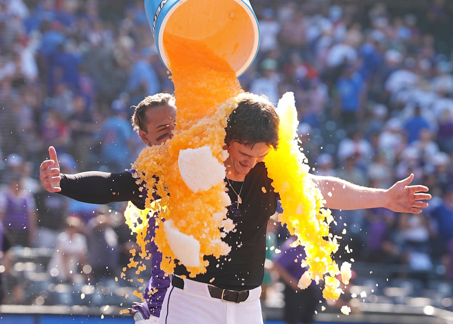 Title: Cubs Rockies Baseball Image ID: 25243808329004 Article: Colorado Rockies' Orlando Arcia, back, douses Mickey Moniak after his walk-off RBI single off Chicago Cubs relief pitcher Daniel Palencia in the ninth inning of a baseball game Sunday, Aug. 31, 2025, in Denver. (AP Photo/David Zalubowski)