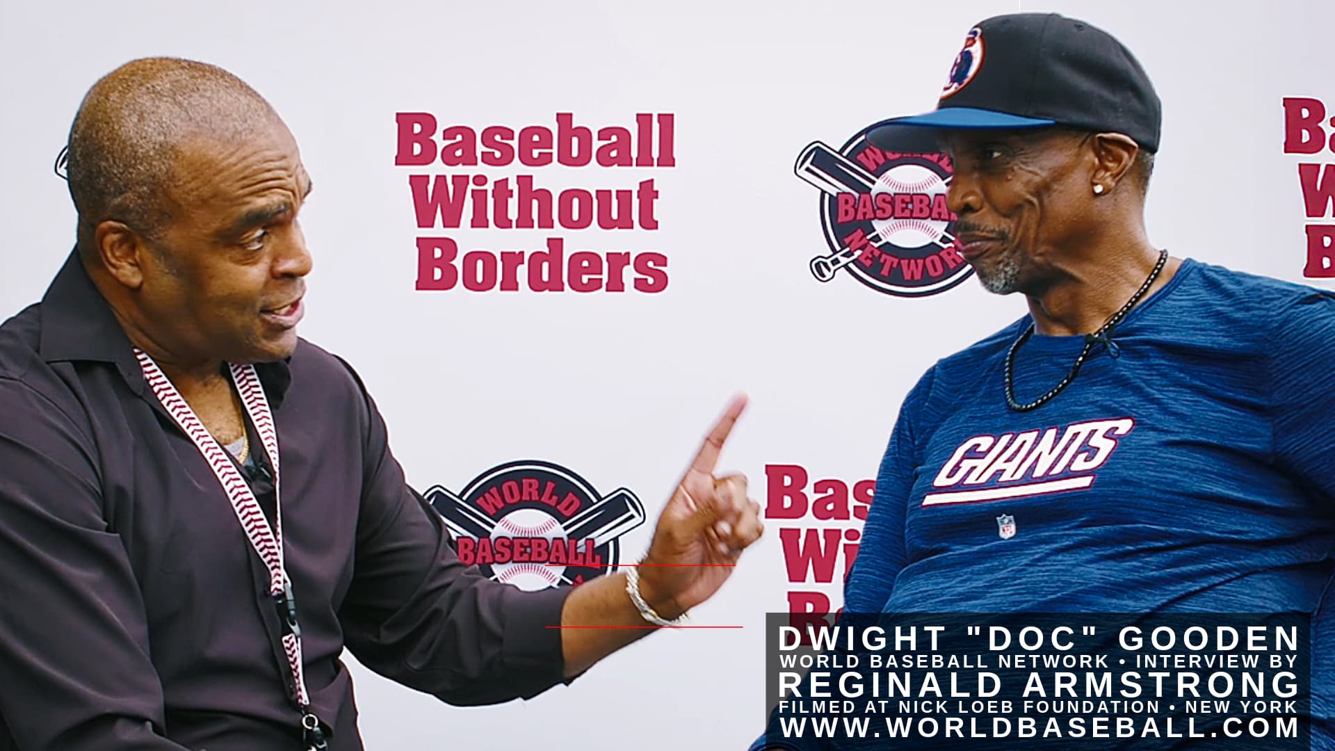 Reginald Armstrong and Dwight “Doc” Gooden before a “Baseball Without Borders” backdrop at Nick Loeb Foundation, Harrison, NY.