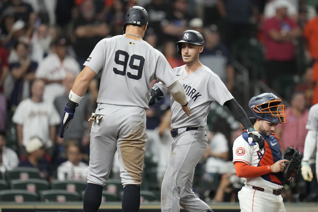 Title: Yankees Astros Baseball Image ID: 25247132927990 Article: New York Yankees' Cody Bellinger (35) celebrates his three-run home run with Aaron Judge against Houston Astros relief pitcher Bryan Abreu during the ninth inning of a baseball game Wednesday, Sept. 3, 2025, in Houston. (AP Photo/Karen Warren)