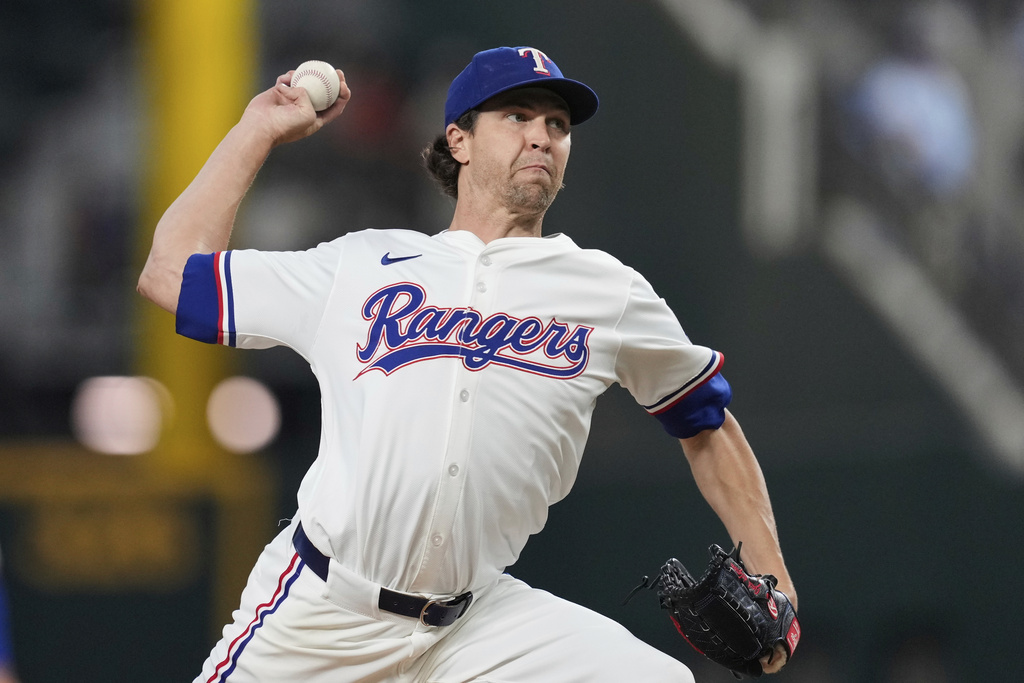 Title: Astros Rangers BaseballImage ID: 25249849994927 Article: Texas Rangers starting pitcher Jacob deGrom throws to the Houston Astros in the first inning of a baseball game Saturday, Sept. 6, 2025, in Arlington, Texas. (AP Photo/Tony Gutierrez) 
