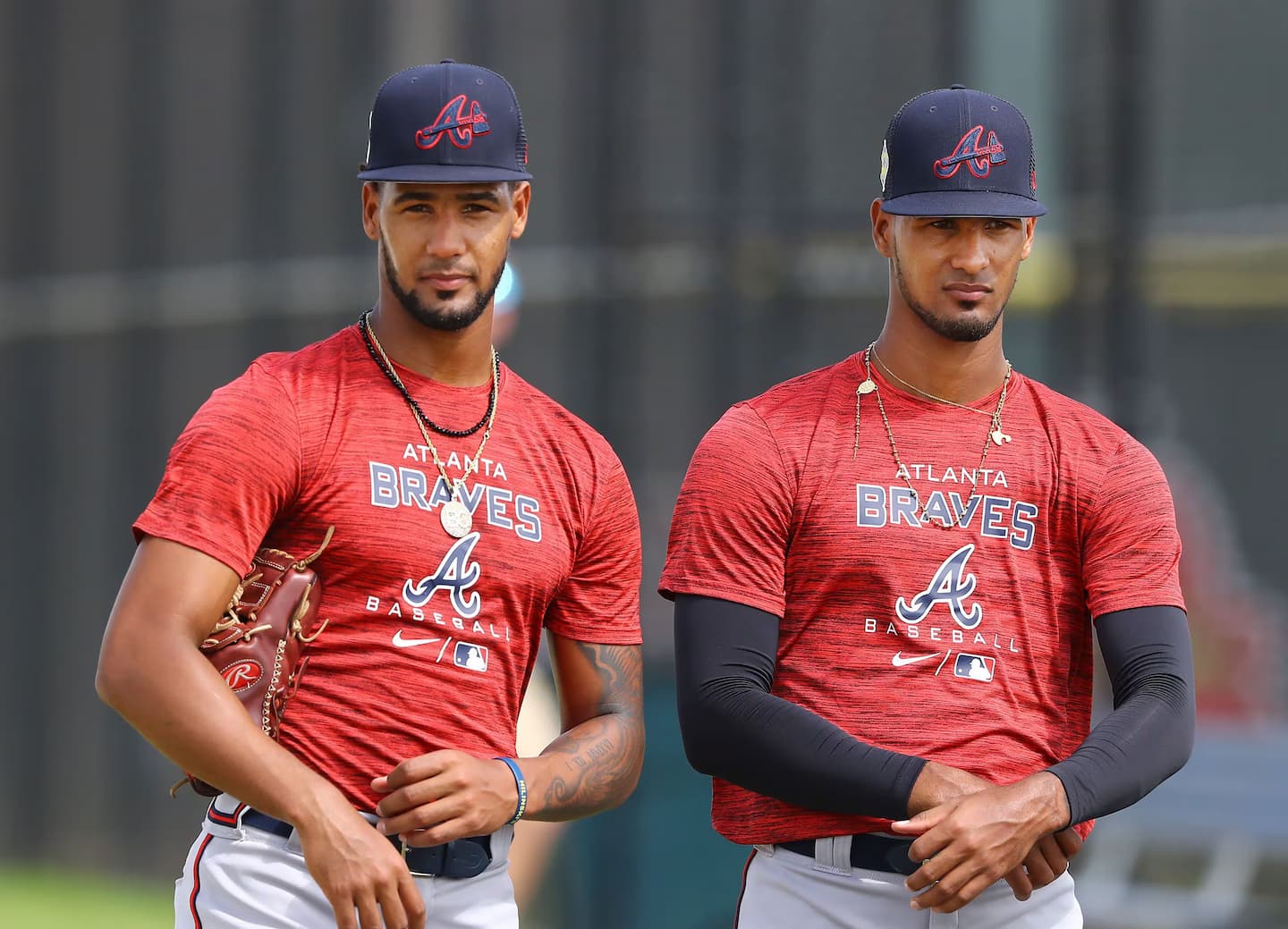 Braves pitching prospects and identical twins Roddery Munoz (left) and Rolddy Munoz prepare to begin a session on the practice mounds at minor league spring training camp on Wednesday, March 9, 2022, in North Port. “Curtis Compton / Curtis.Compton@ajc.com”`