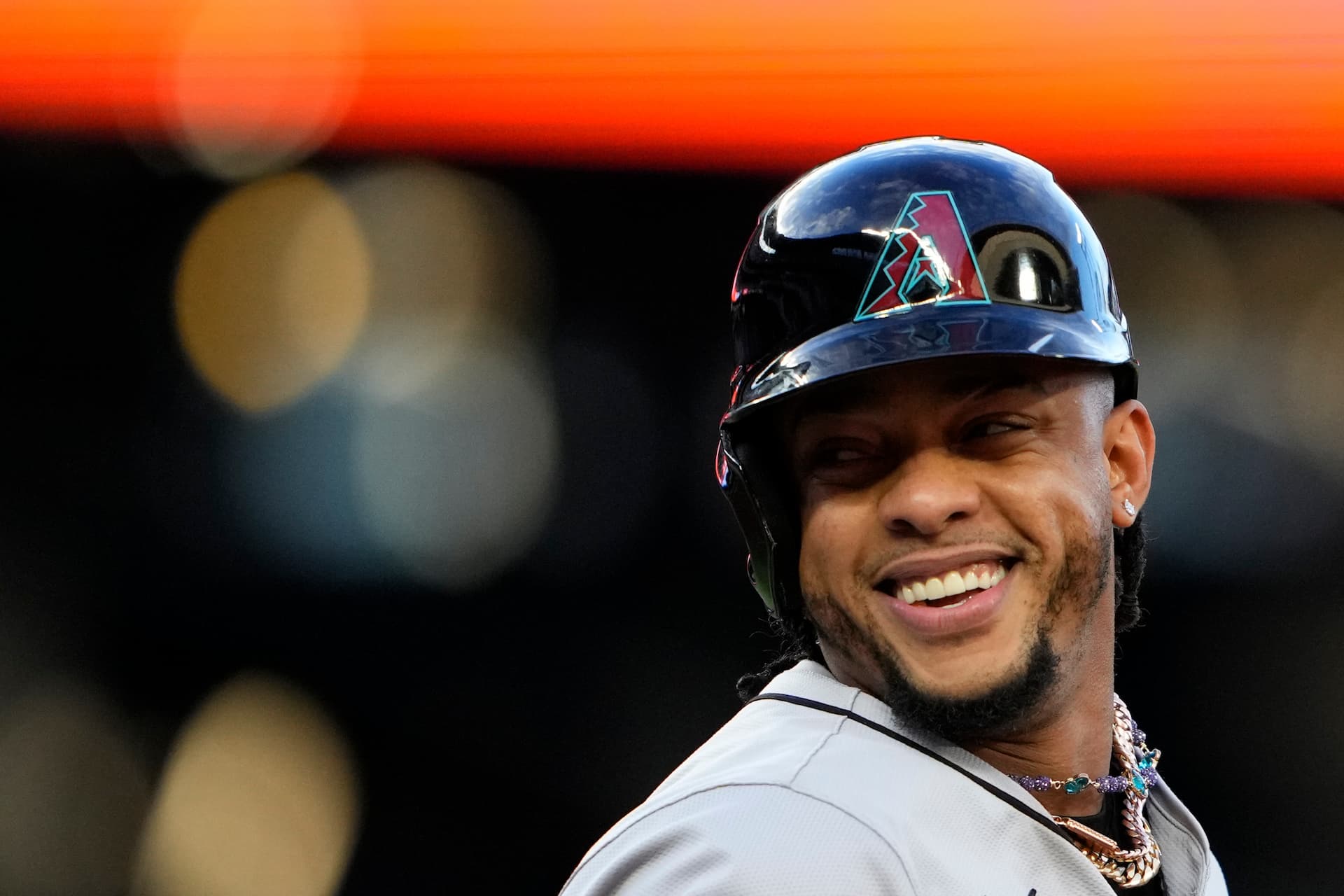 Title: Diamondbacks Mariners Baseball Image ID: 24118789755165 Article: Arizona Diamondbacks' Ketel Marte smiles while jogging to first base on a walk against the Seattle Mariners in a baseball game Friday, April 26, 2024, in Seattle. (AP Photo/Lindsey Wasson)