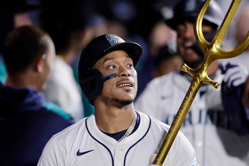 AP25120136569638 1 - World Baseball Network Title: Angels Mariners BaseballImage ID: 25120136569638 Article: Seattle Mariners' Jorge Polanco is congratulated in the dugout on his two-run home run on a pitch from Los Angeles Angels pitcher Jose Fermin during the seventh inning of a baseball game, Tuesday, April 29, 2025, in Seattle. (AP Photo/John Froschauer)
