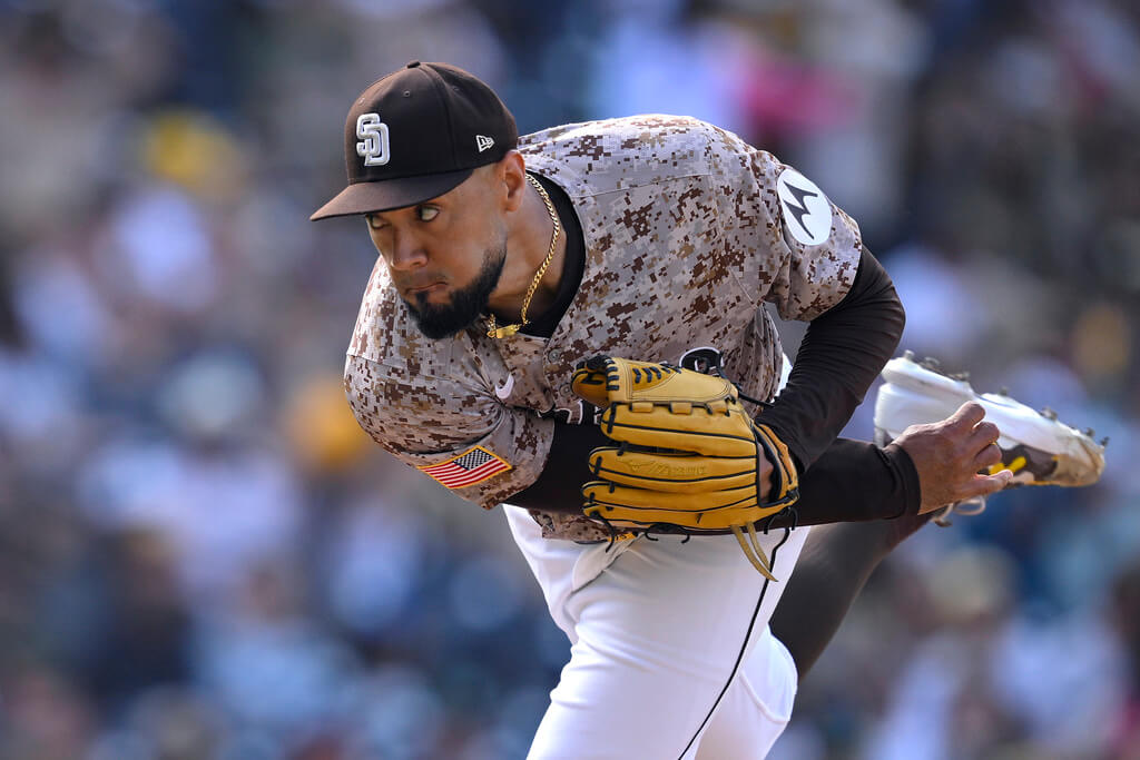 San Diego Padres relief pitcher Robert Suarez works against a Colorado Rockies batter during the ninth inning of a baseball game Sunday, Sept. 14, 2025, in San Diego. (AP Photo/Orlando Ramirez)