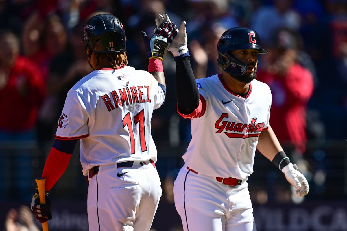 Title: Tigers Guardians Baseball Image ID: 25274641492716 Article: Cleveland Guardians' George Valera, right, celebrates with José Ramírez, left, after hitting a solo home run in the first inning of Game 2 of the American League Wild Card baseball playoff series against the Detroit Tigers in Cleveland, Wednesday, Oct. 1, 2025. (AP Photo/David Dermer)