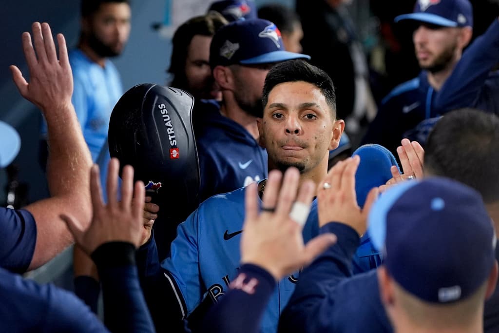 Title: World Series Blue Jays Dodgers BaseballImage ID: 25303093383511 Article: Toronto Blue Jays' Andrés Giménez celebrates scoring on a base hit by Bo Bichette during the seventh inning in Game 5 of baseball's World Series, Wednesday, Oct. 29, 2025, in Los Angeles. (AP Photo/Ashley Landis) 